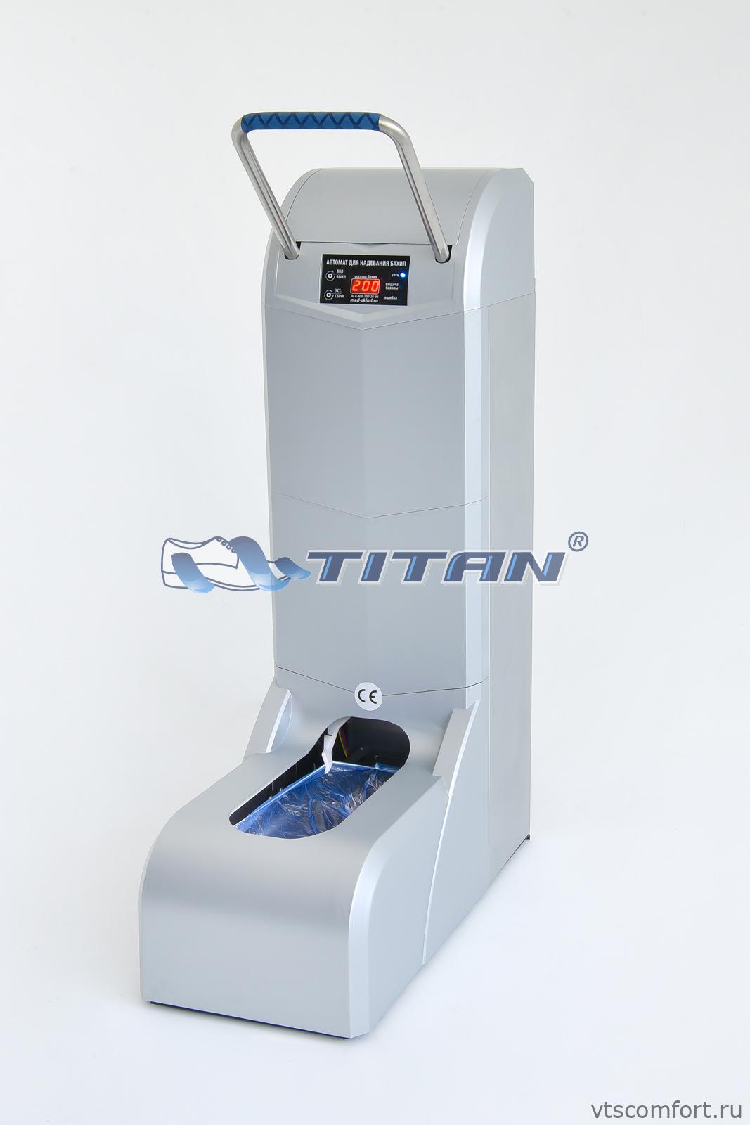 Фото Titan 200 Аппарат для надевания бахил (бахиломат) серебристый Изображение Titan 200 Аппарат для надевания бахил (бахиломат) серебристый